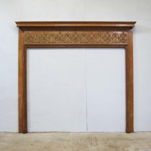 A George III carved pine and limewood fire surround-0