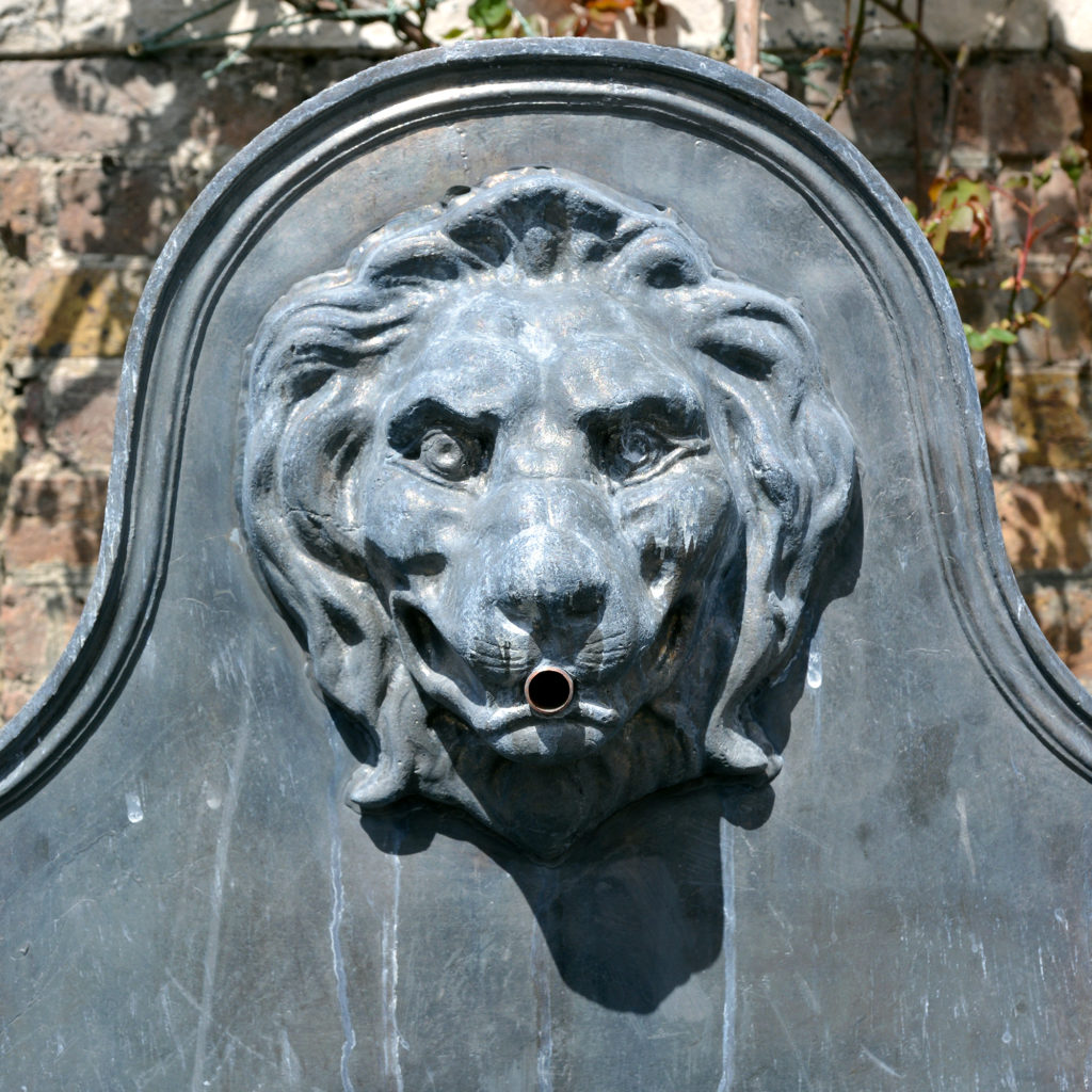 An English lead cistern with lion mask spout-88499