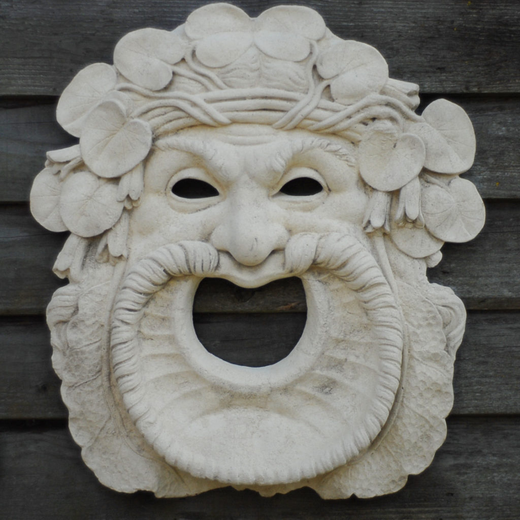 A composition stone fountain mask of Silenus-0