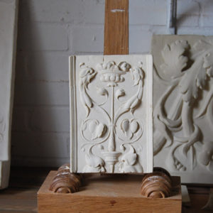 A cast plaster section of ornamental relief-0