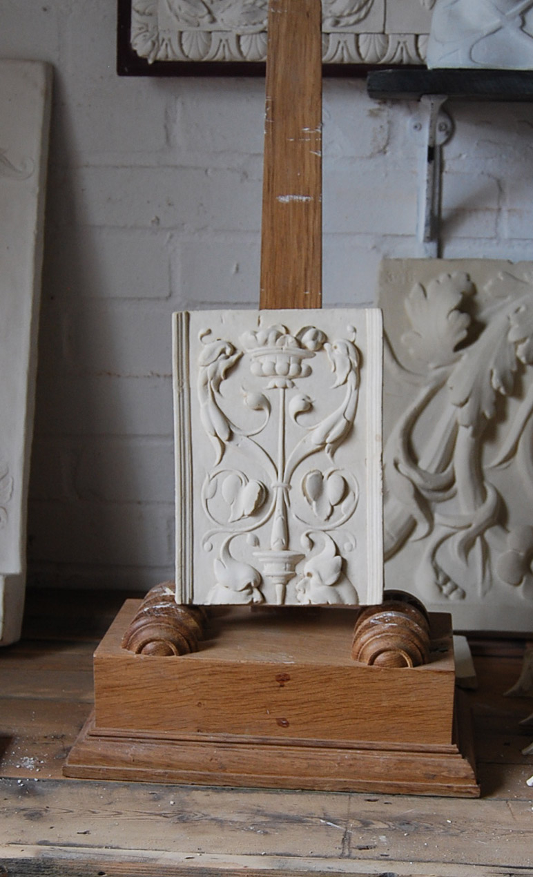 A cast plaster section of ornamental relief-0