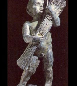 An English bronze figure of a putto personifying "Summer"-0
