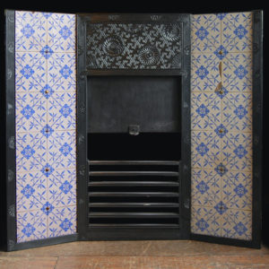 An Aesthetic Movement cast iron 'Parson's Grate' with original tiled cheeks-0