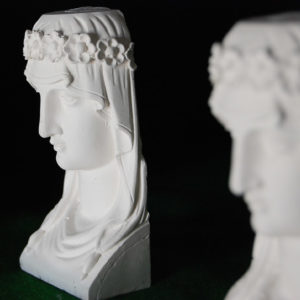 An English cast plaster model of a female Grecian head-0