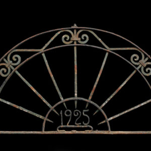 A wrought iron demi-lune over door-0