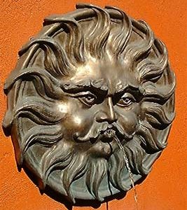 An English bronze wall fountain modelled as-0