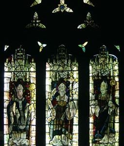 A Victorian three light stained glass window,-0
