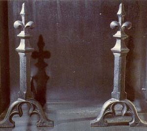 A pair of cast iron andirons,-0