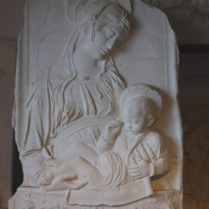 An English cast plaster relief of the Madonna and Child,-0