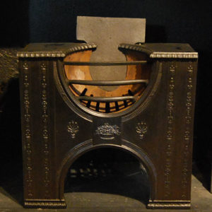 A late George III cast iron hob grate-0