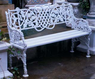 A cast iron two seater garden bench-0