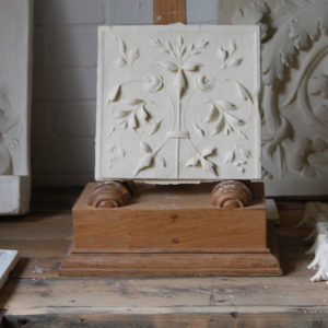 A cast plaster section of delicate ornamental relief-0