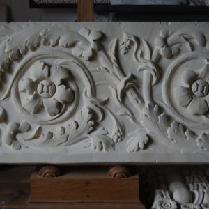 A cast plaster section of foliate scroll frieze-0
