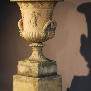 An English reconstituted stone semi-lobed Campana urn-0