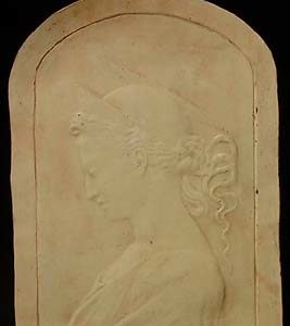 An Italian composition stone portrait relief of "St. Cecilia"-0