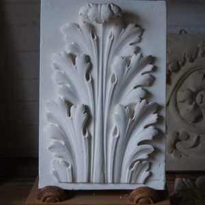 A cast plaster acanthus leaf relief-0