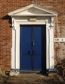 An English limestone pedimented doorcase-0
