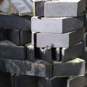 A quantity of Staffordshire Blue triangular coping bricks-0