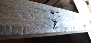 Apotropaic carvings in an oak lintel