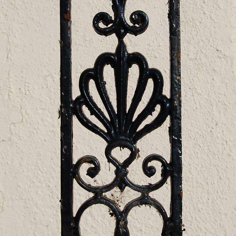 A pair of late Regency painted cast iron verandah pilasters,-0