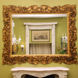 A large and impressive continental giltwood mirror,-0