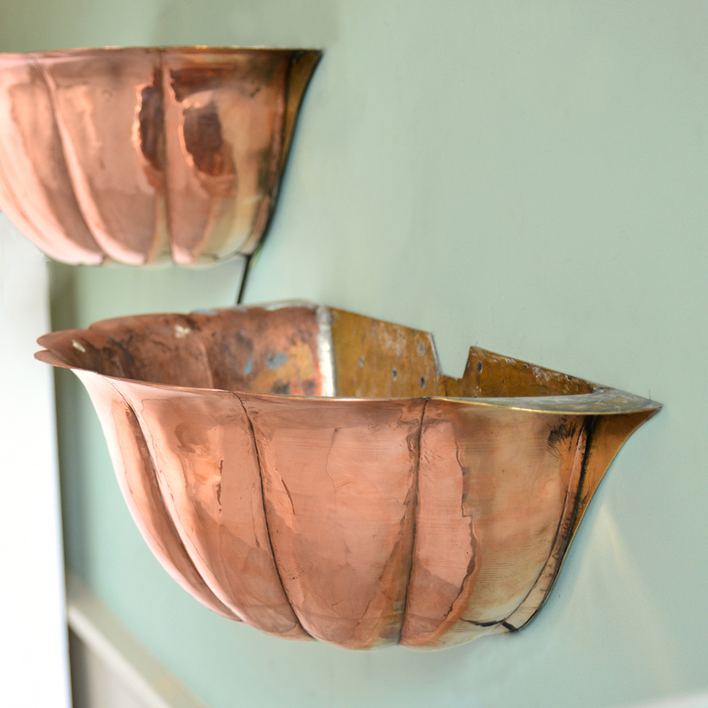 Copper and brass uplighters