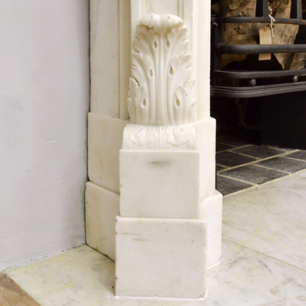 A large English Rococo Revival White Carrara marble chimneypiece,-87107