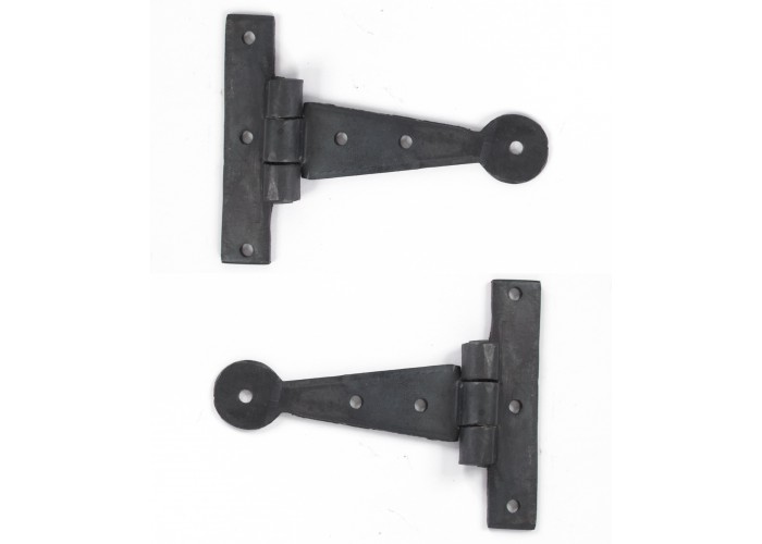 A wrought iron 4" T hinge