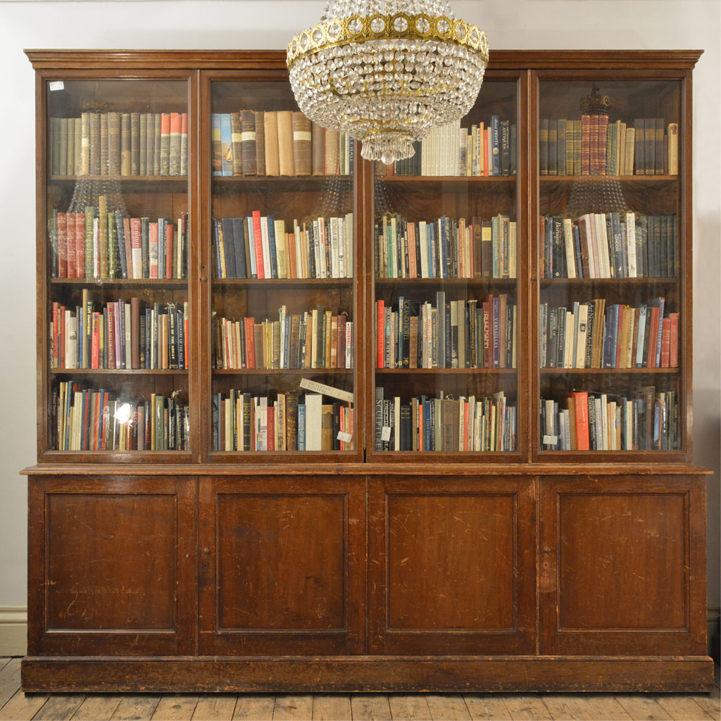 A large poplar and glazed bookcase,-0