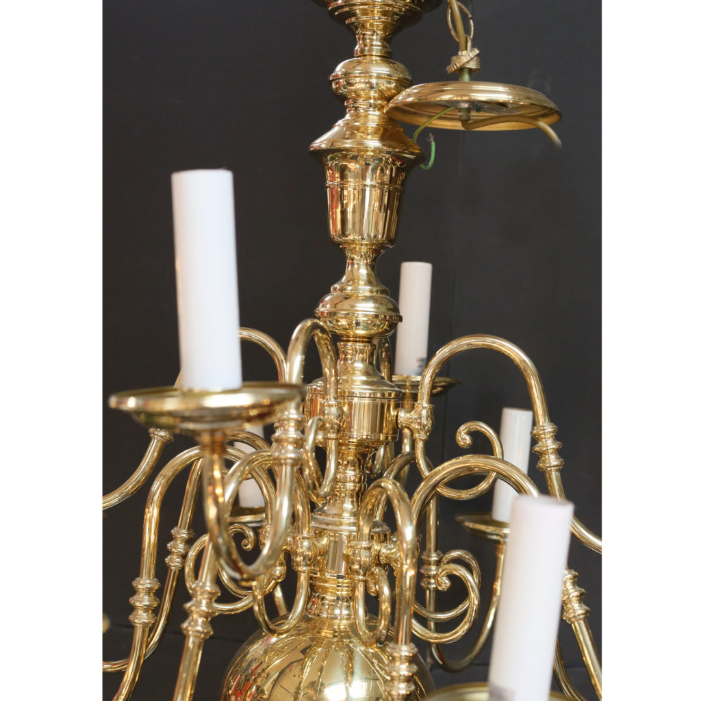 A large two tier Dutch style brass chandelier,-85662