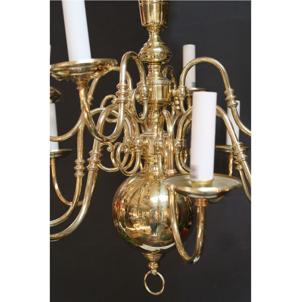 A large two tier Dutch style brass chandelier,-85660