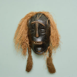 A Poro tribe mask,-0