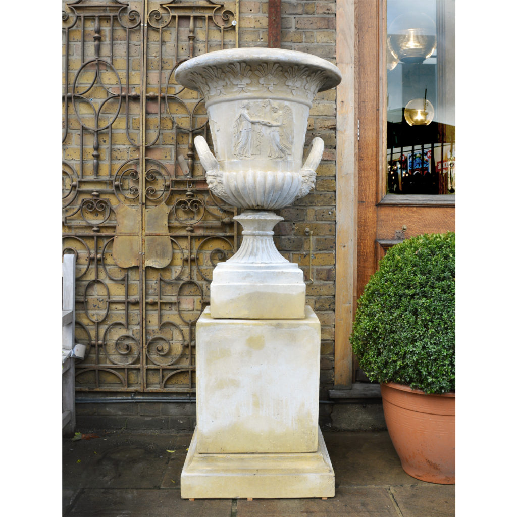 An English reconstituted stone Campana urn,-0