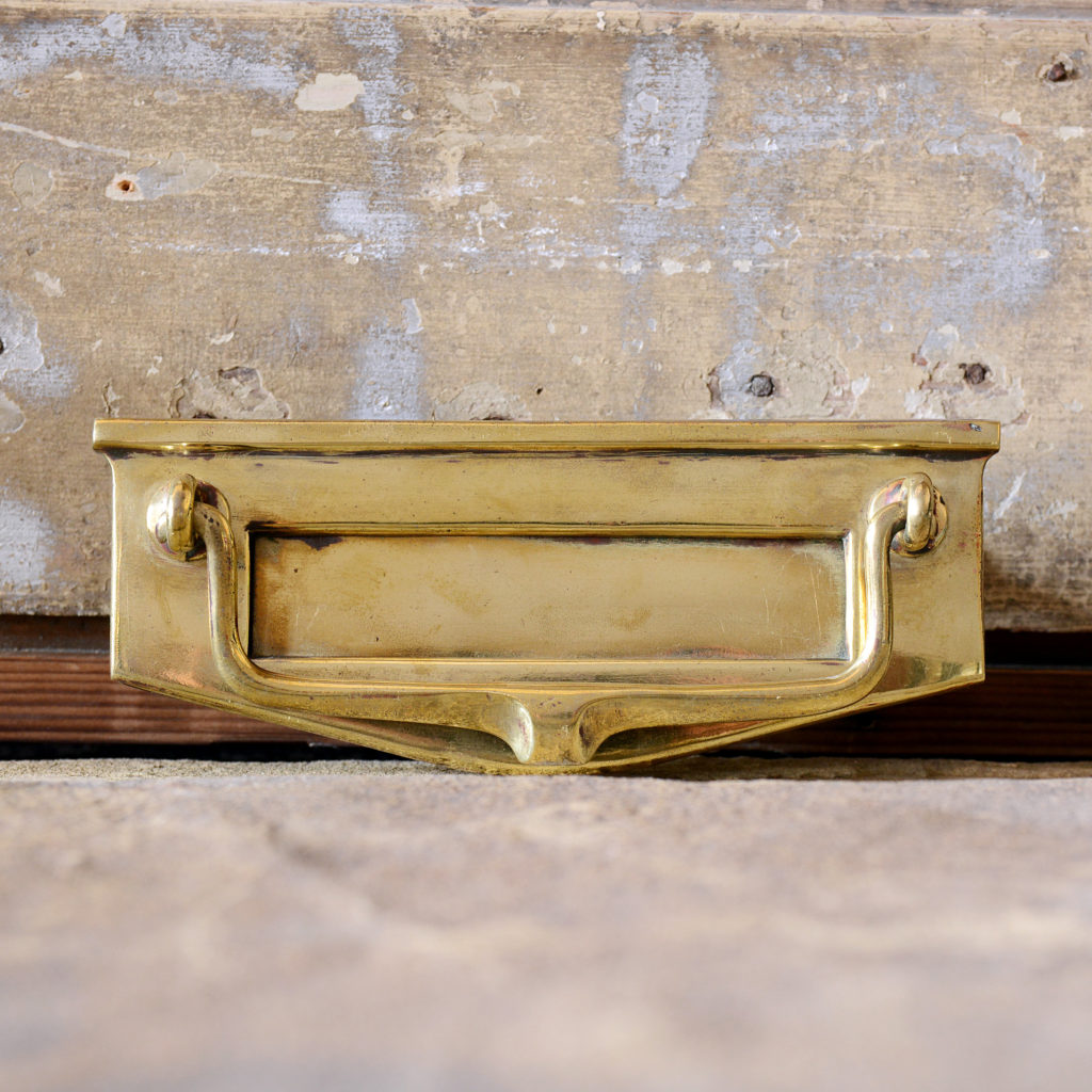 A brass letterplate,-95177