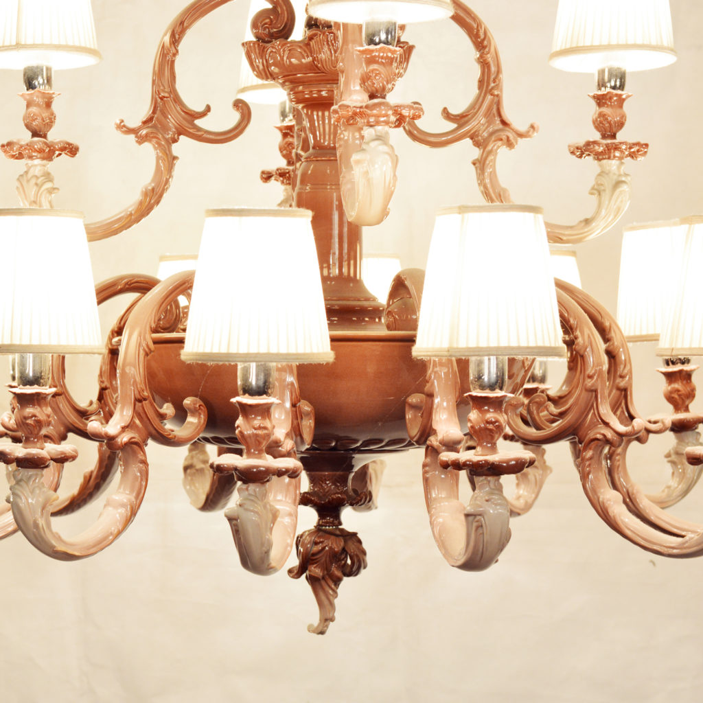 A large two tier sixteen branch ceramic chandelier,-87245