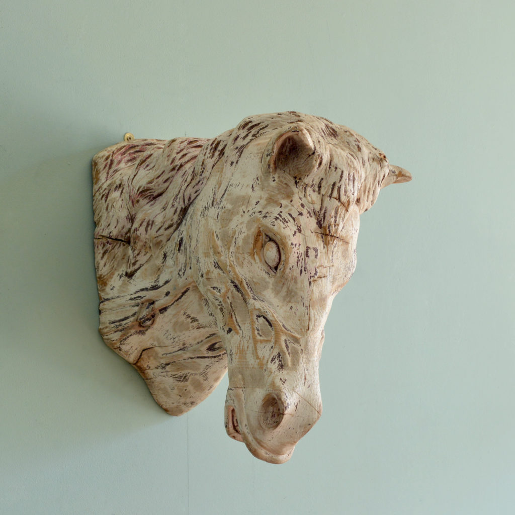 Carved wood horse's head