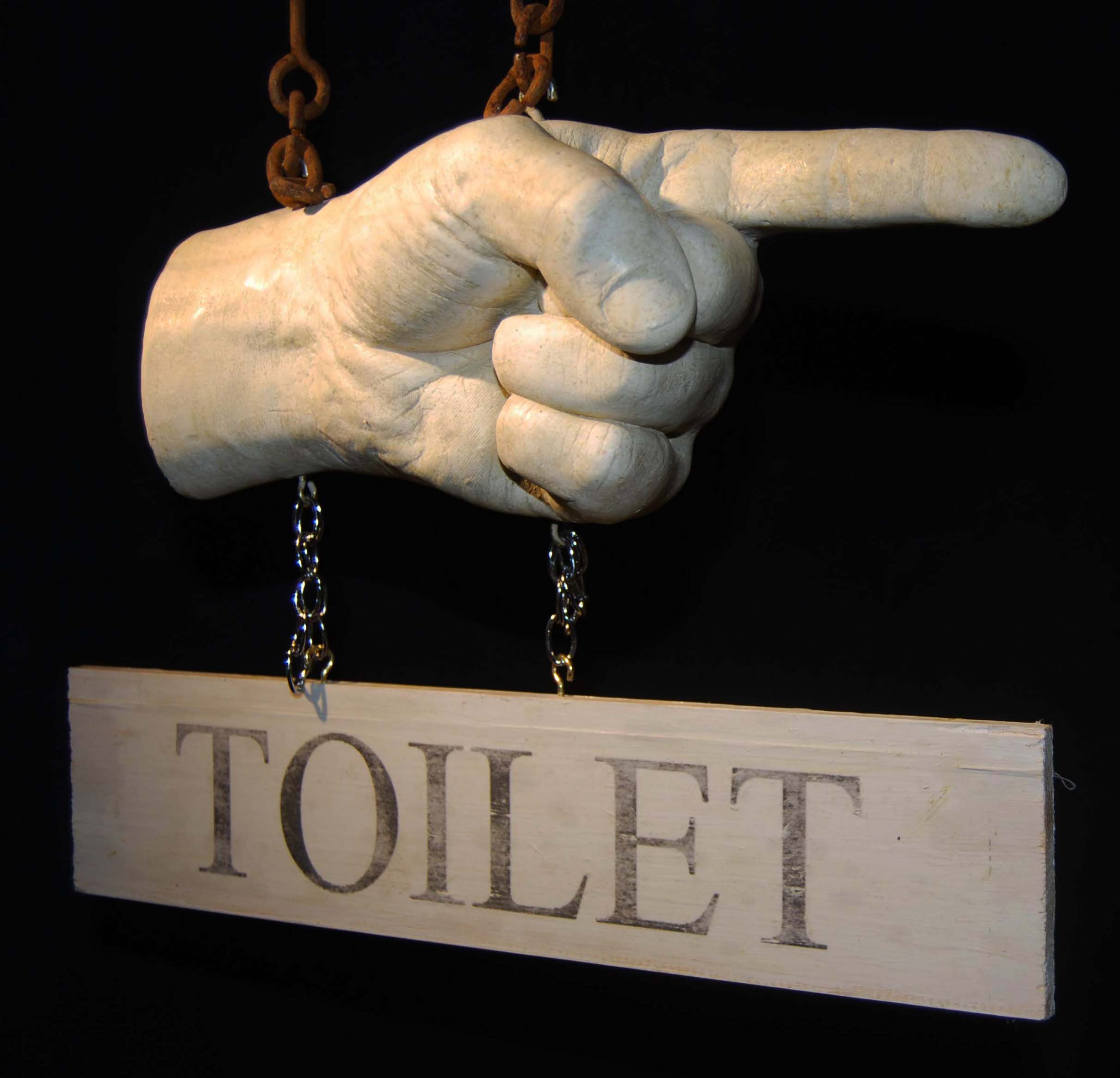 A novelty hanging sign in cast plaster-95213