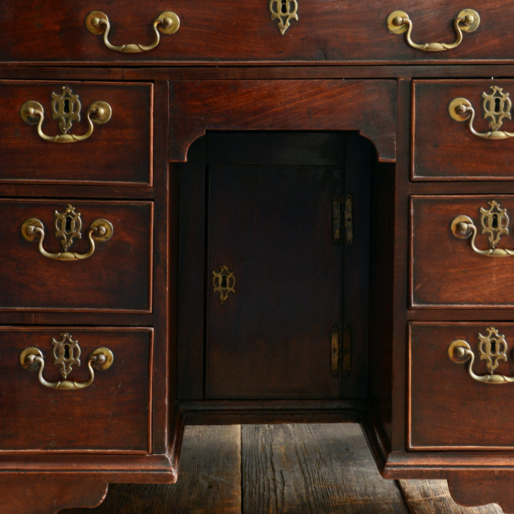 A George II mahogany kneehole desk,-96015