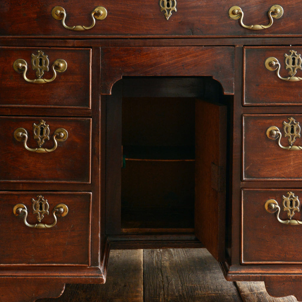 A George II mahogany kneehole desk,-96017