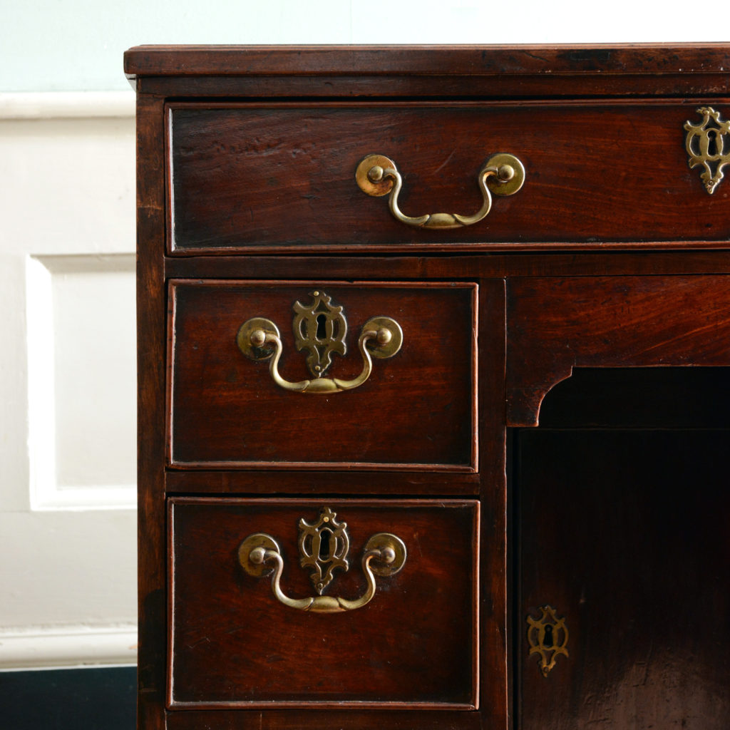 A George II mahogany kneehole desk,-96011