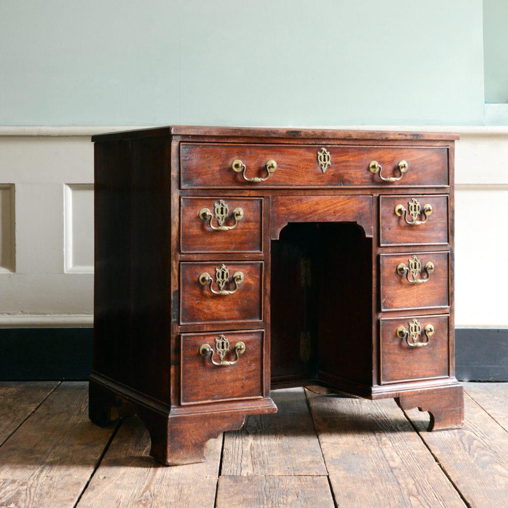 A George II mahogany kneehole desk,-96005