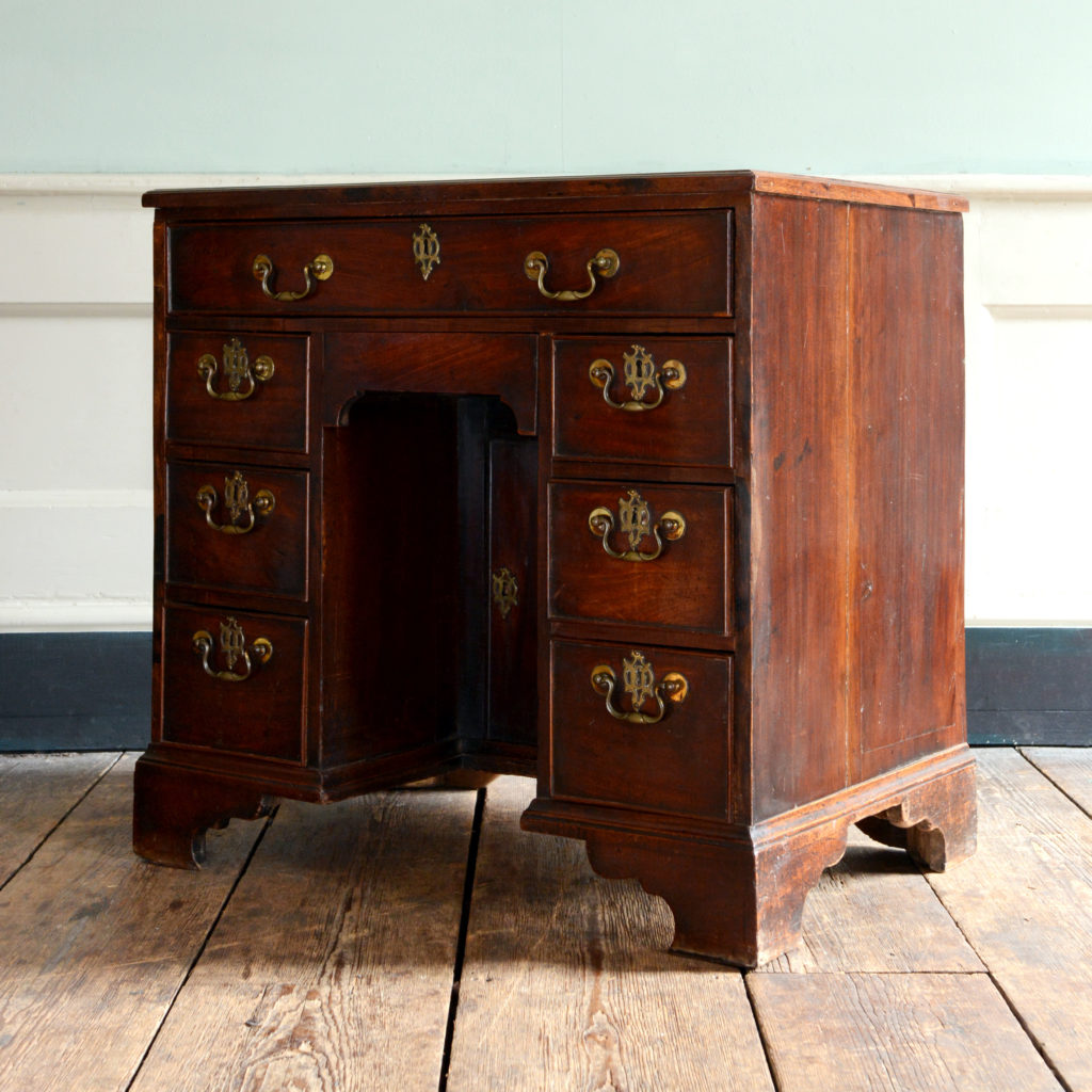 A George II mahogany kneehole desk,-96010