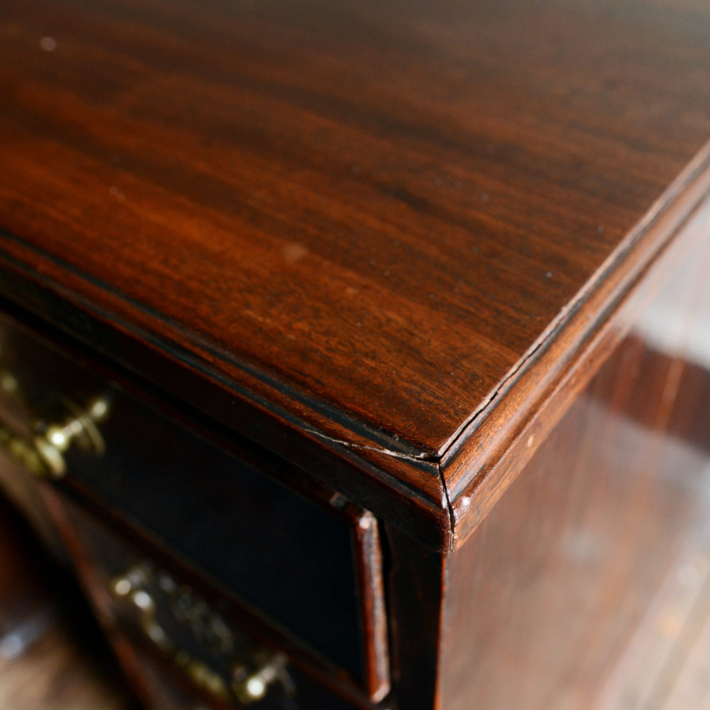 A George II mahogany kneehole desk,-96007
