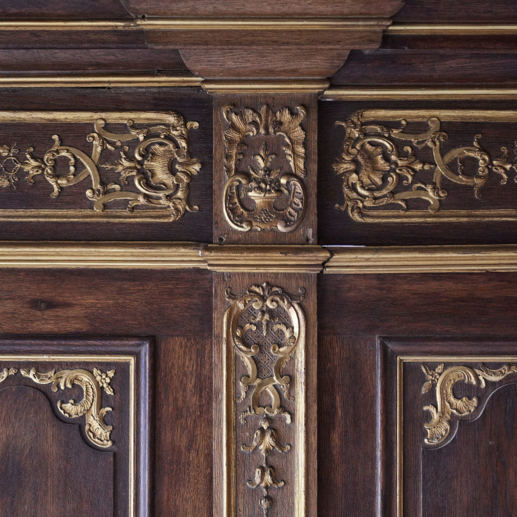 A spectacular French parcel-gilt oak panelled dining room,-105364