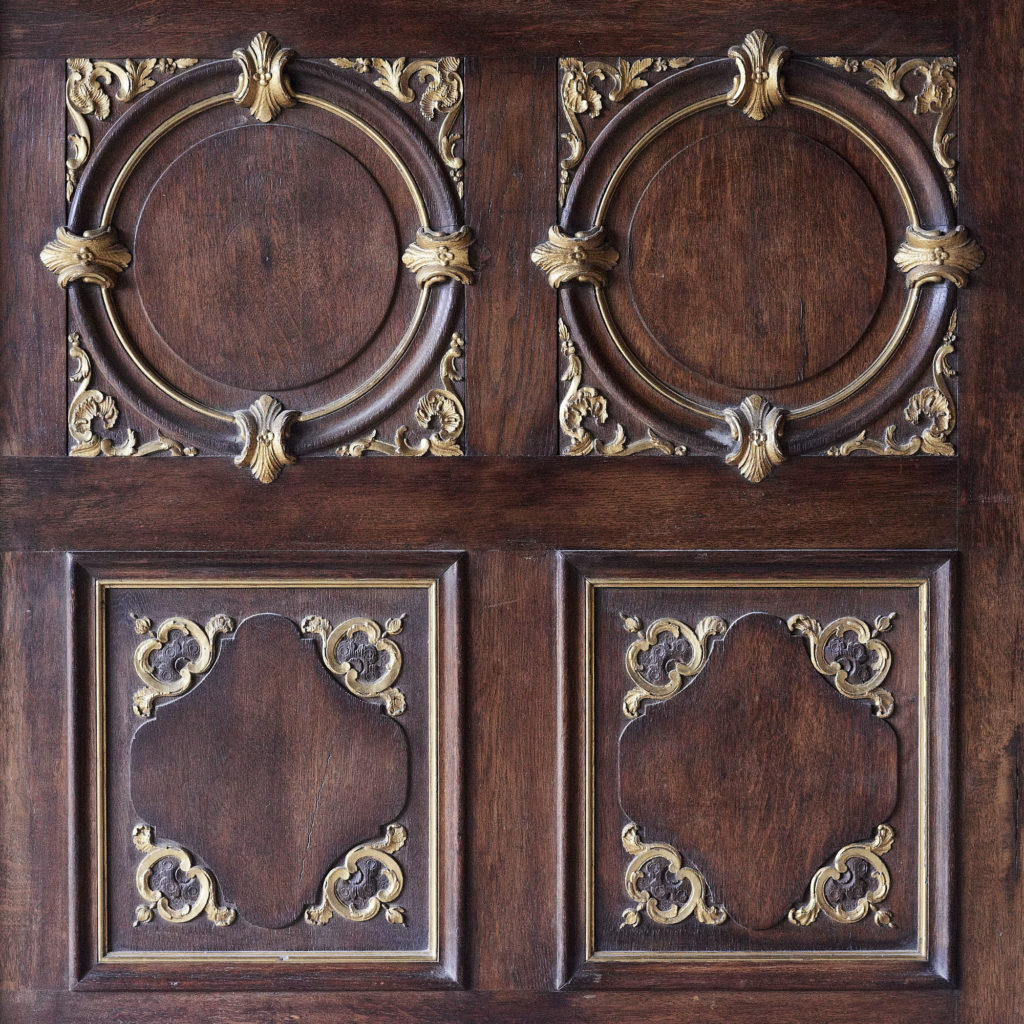 A spectacular French parcel-gilt oak panelled dining room,-105366