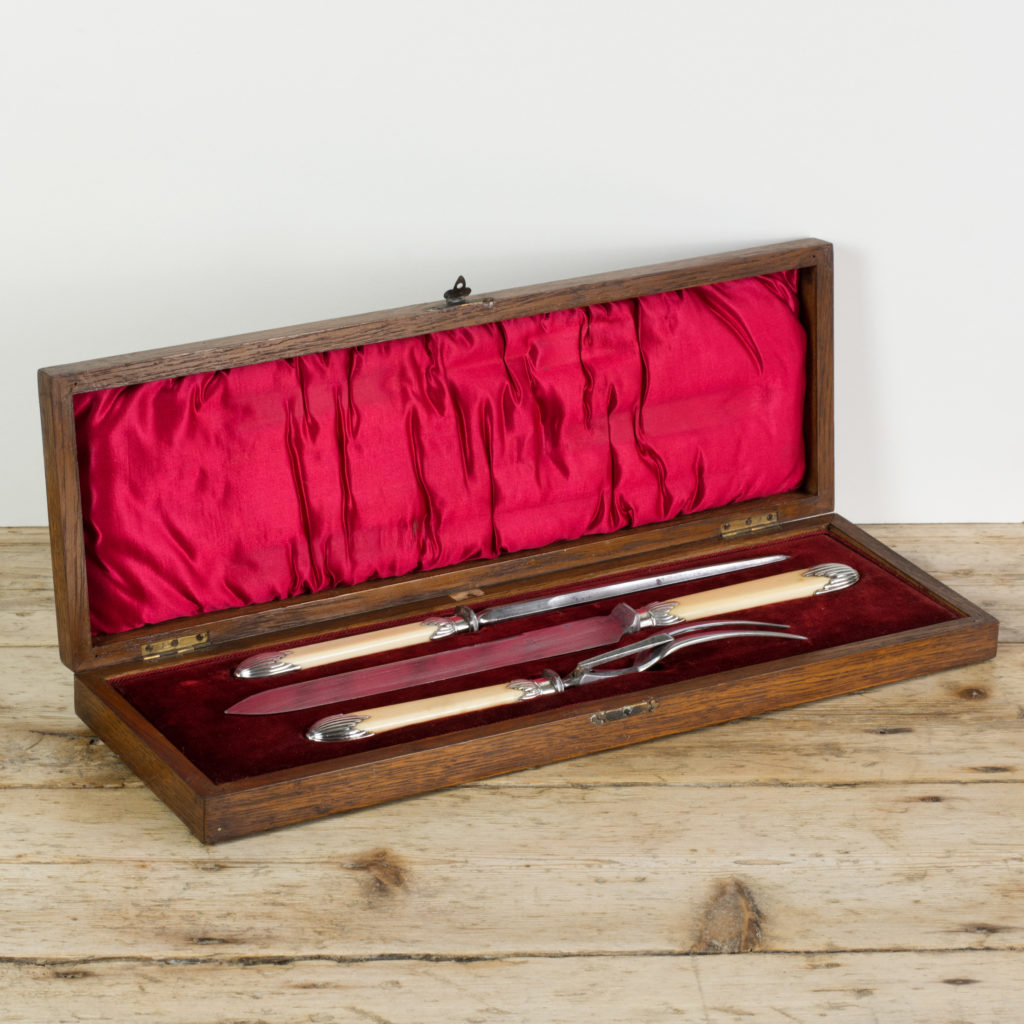 A 1930's bone handled carving set