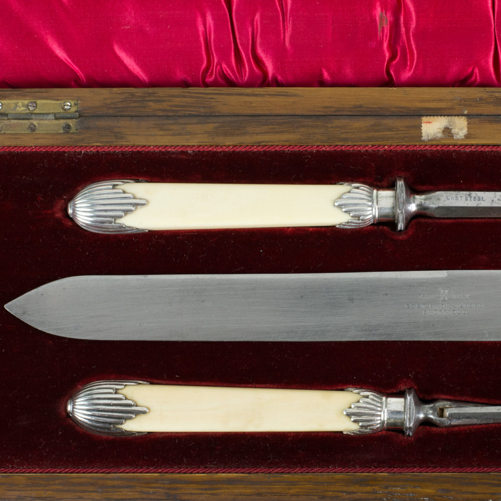 A Victorian bone handled carving set,-99419