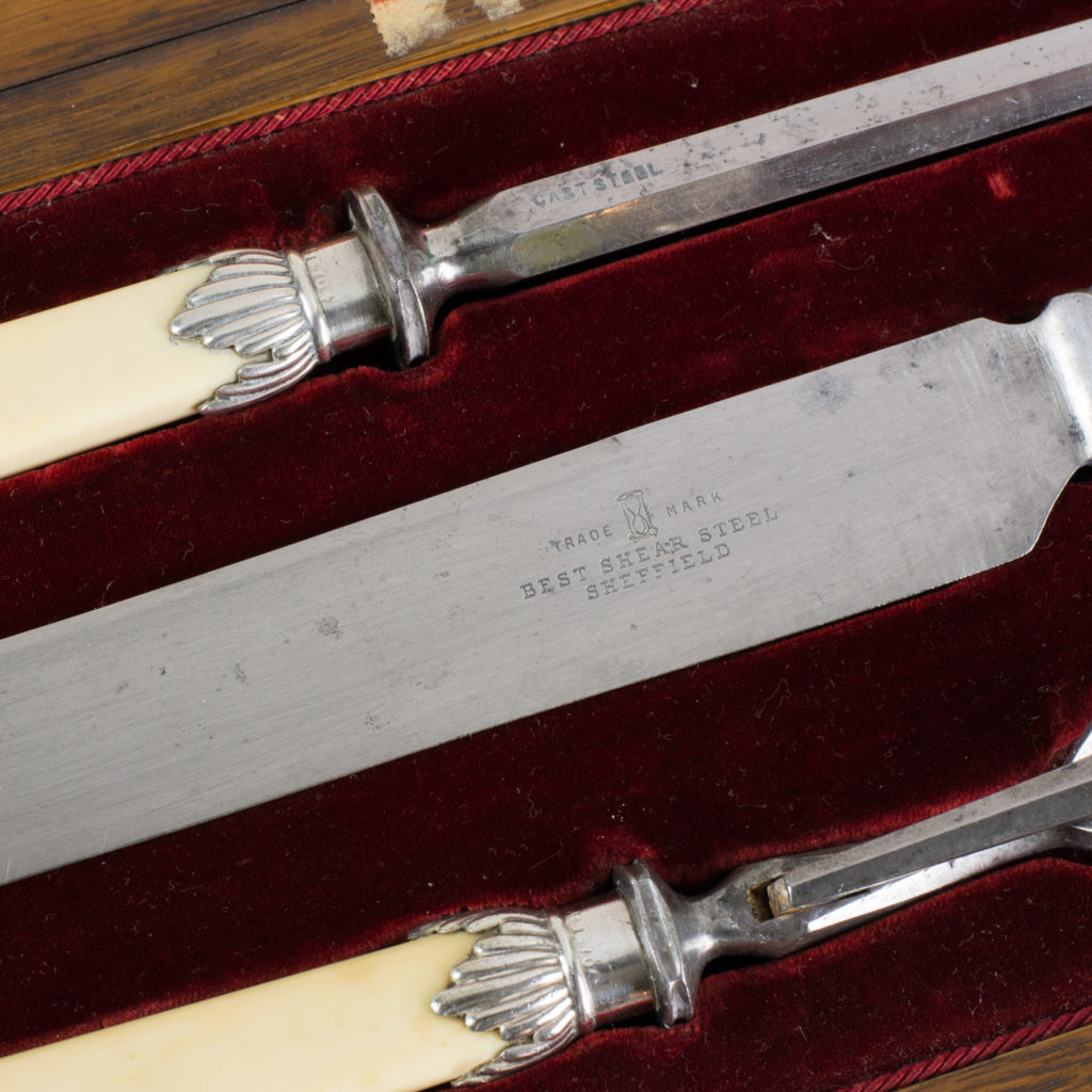 A Victorian bone handled carving set,-99422