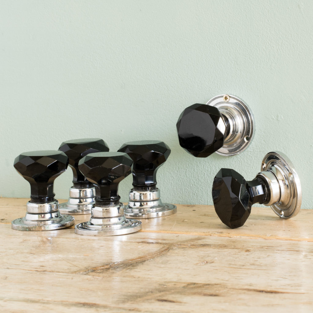 Chrome and black glass door knobs