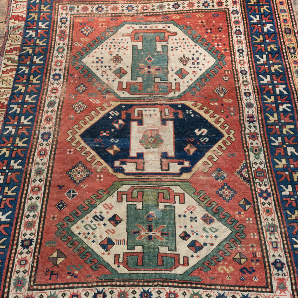 An antique Caucasian Kazak carpet,-0